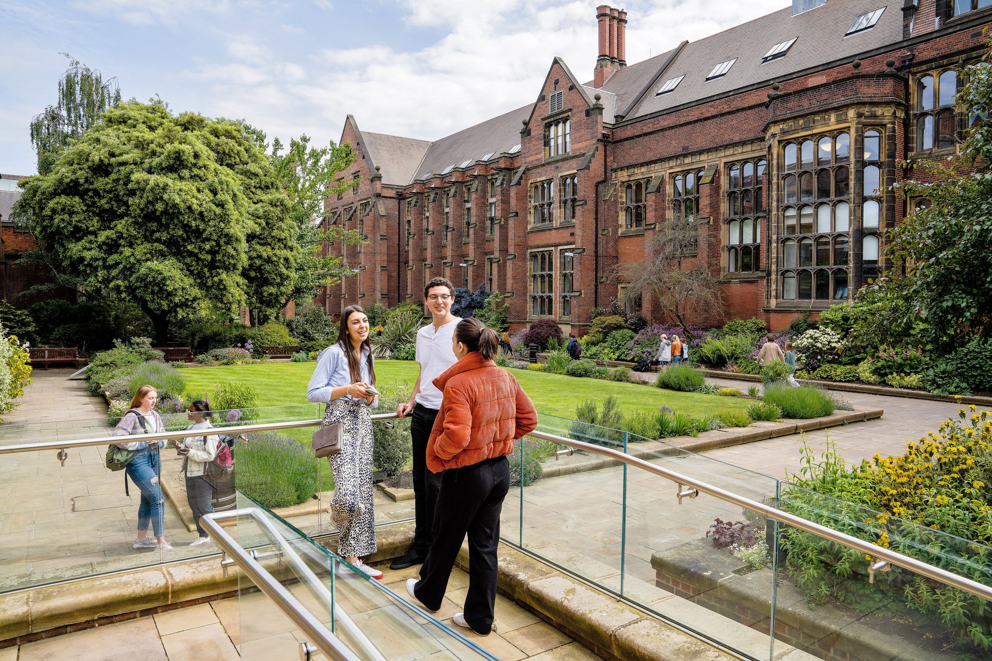 students-talking-outside-on-campus