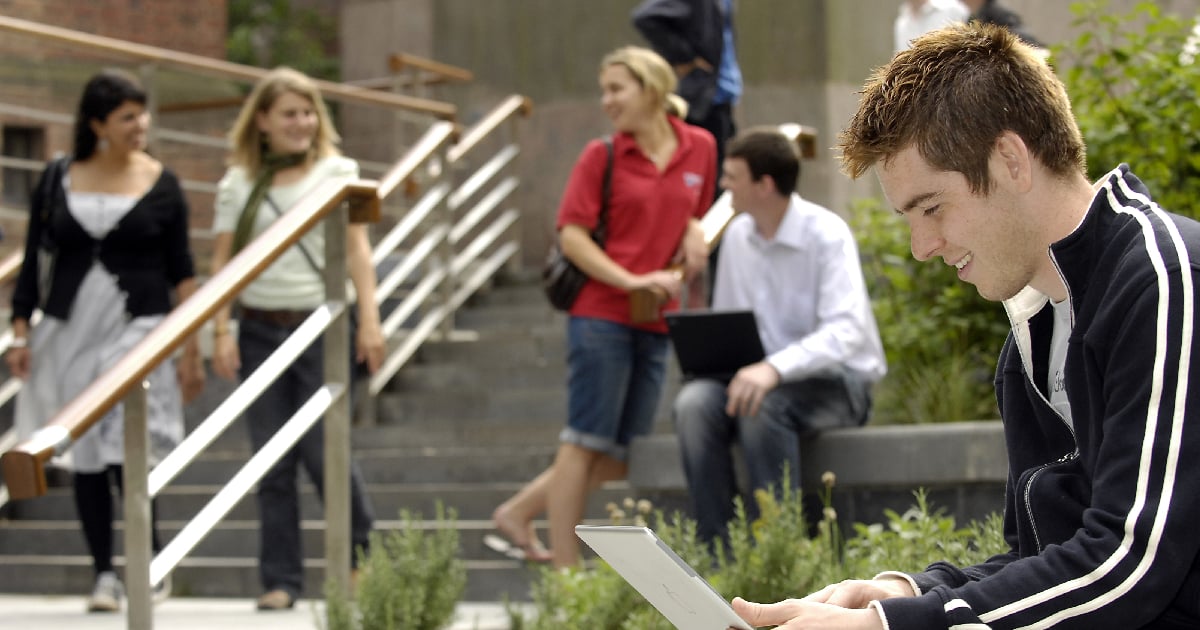 Newcastle University student working on tablet