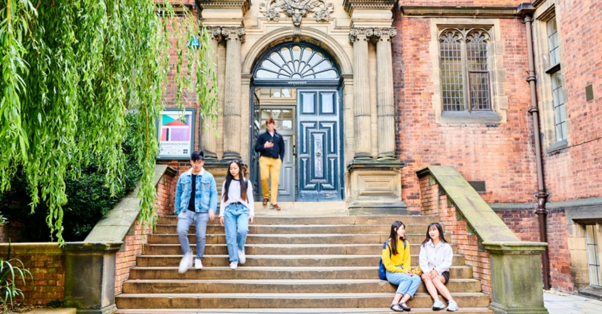 International_students_gathering_outside_university_building